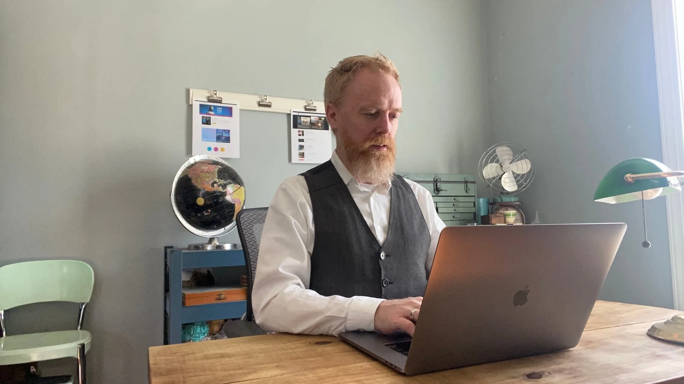 Man at desk on computer